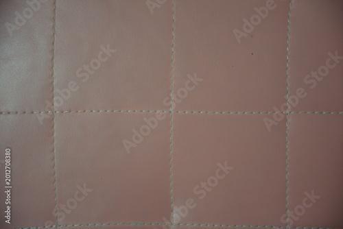a close up of a seat cushion in pink