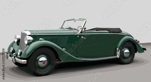 Konstfotografi A classic dark green convertible automobile from the 1940s era, parked indoors against a neutral background