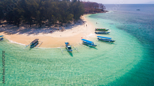 Aerial View of Tropical Gili Island Beach with Traditional Outrigger Boats