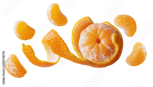 Peeled tangerine with segments and peel scattered, isolated on transparent background