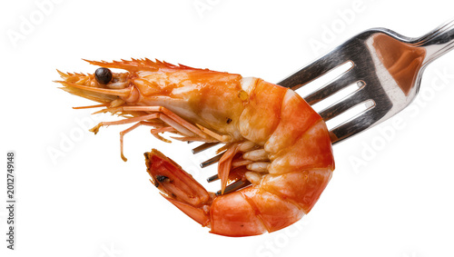 Photos Cooked orange shrimp impaled on a silver fork, isolated on transparent backgroun