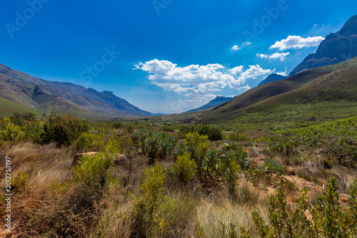 An amazing view on a perfect day over the Jonkershoek Nature Reserve located close to Stellenbosch in South Africa and home to the Jonkershoek Mountains and the impressiv valley. The reserve includes 