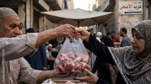 Muslim man gives sacrificial meat to woman in a busy street market for Eid al-Adha, isolated on transparent background.