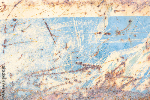 Abstract Blue and Beige Grunge Texture Background with Scratches and Rust Marks
