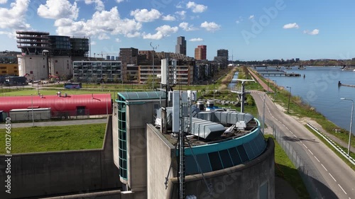 Drone close up of 4G and 5G telecom antenna systems, showing wireless network infrastructure, signal transmission, mobile connectivity, and broadcasting technology.