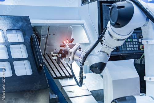 automatic gripping and smart robot working on smart factory,industry 4.0 and technology.