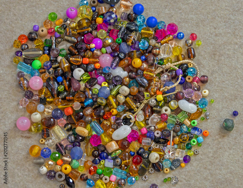 Fotografija Colorful decorative plastic knick and knacks jewelery pile