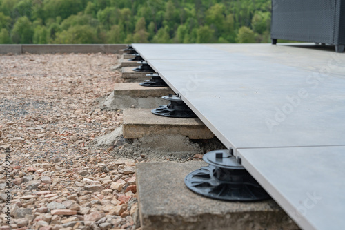 Cuadro en lienzo Close-up of an adjustable pedestal used for leveling a terrace deck