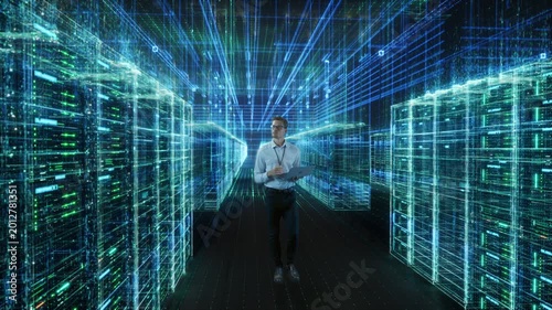 IT Engineer Walks Through Digtitized Data Center, Using a Laptop Amid Glowing Server Racks, Holographic Network Lines and Immersive Blue Cyber Infrastructure. Activating AI Analysis