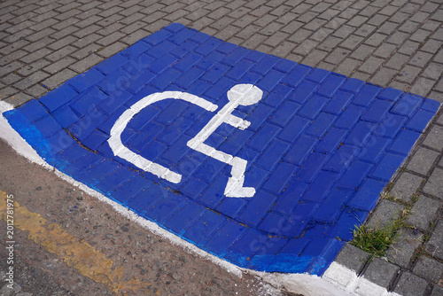 Blue Accessibility Ramp with International Symbol for Inclusive Urban Infrastructure and Mobility