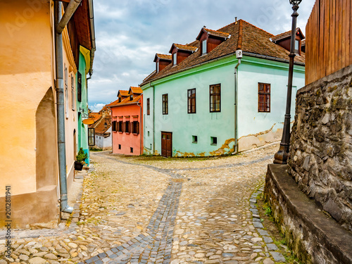 Cuadro en lienzo Traditional colorful house facade with wooden windows in Sighisoara Romania birt