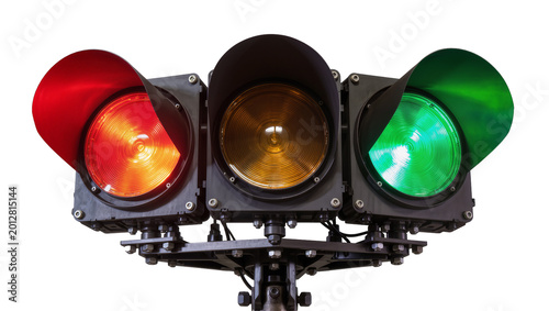 Konstfotografi Three-light traffic signal with red yellow and green lights illuminated, isolate