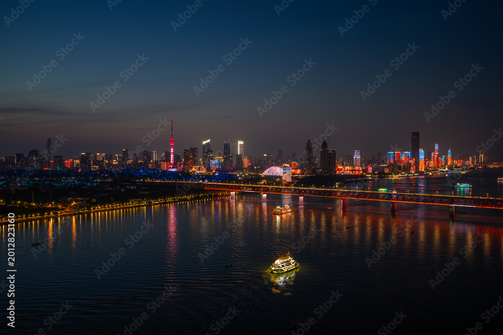 Fototapeta premium Night view of Wuhan, Hubei, China's city skyline and landmarks