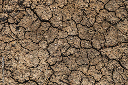 Tableau sur toile Aerial View of Arid Cracked Ground Texture, Dry Earth Background for Environment