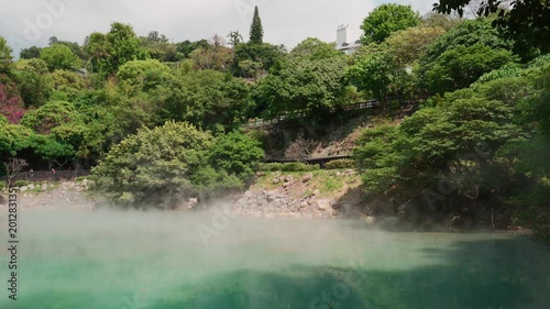 Steaming Beitou Thermal Valley Lake Surrounded by Lush Forest