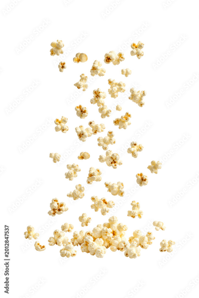 Fototapeta premium Flying popcorn pieces falling in midair isolated on white background, dynamic snack food motion concept with scattered buttery kernels and copy space for advertising or packaging design