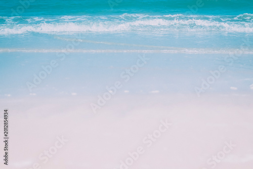 Pristine Tropical Shoreline Under Soft Radiant Summer Light