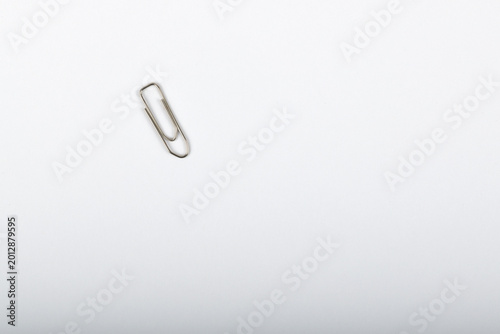 Close up top view of paper clip isolated on white background