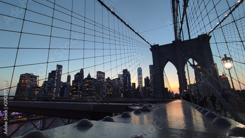 Photos Twilight over Manhattan: The Brooklyn Bridge Suspension Cables and Lower Manhatt