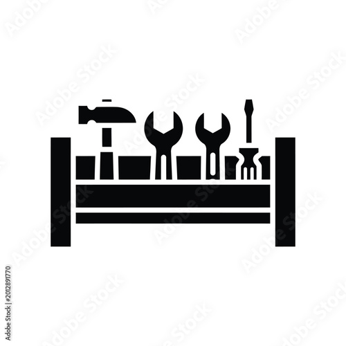 Assorted tools on a workbench including a hammer, wrenches, and a screwdriver, black and white illustration