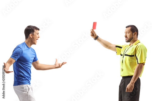 Konstfotografi Referee showing red card to an agngry football player