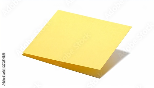 A blank, folded, light yellow sticky note casts a subtle shadow on white