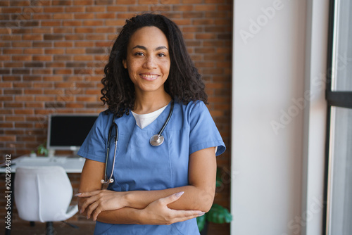 Canvastavla Headshot portrait of young african-american female nurse at home, healthcare wor