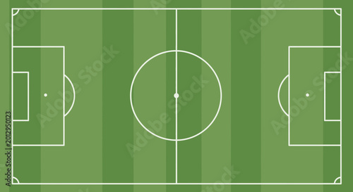 Canvas Print Green soccer field with white lines.