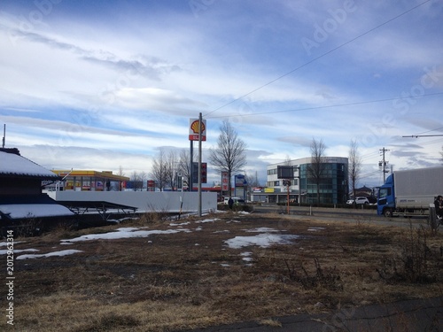 Urban Area With Buildings And Open Field