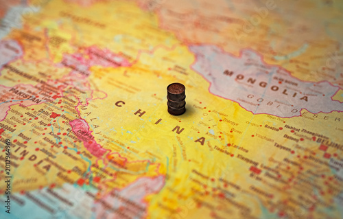 Small oil barrel placed on China map.