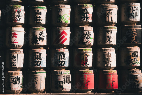 Принти на полотні Decorative Sake Barrels Kazaridaru Stacked Wall Meiji Jingu Shrine Dramatic Ligh