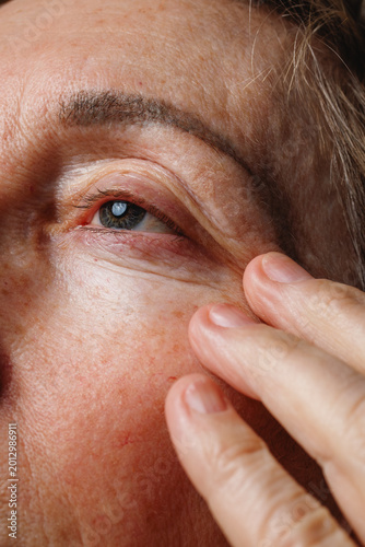 Fotografía Closeup of senior woman eye and natural skin texture in beauty and aging concept