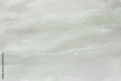 Photos Crystal clear cosmetic gel texture abstract white background for deep hydration and skin nourishing and moisturizing care