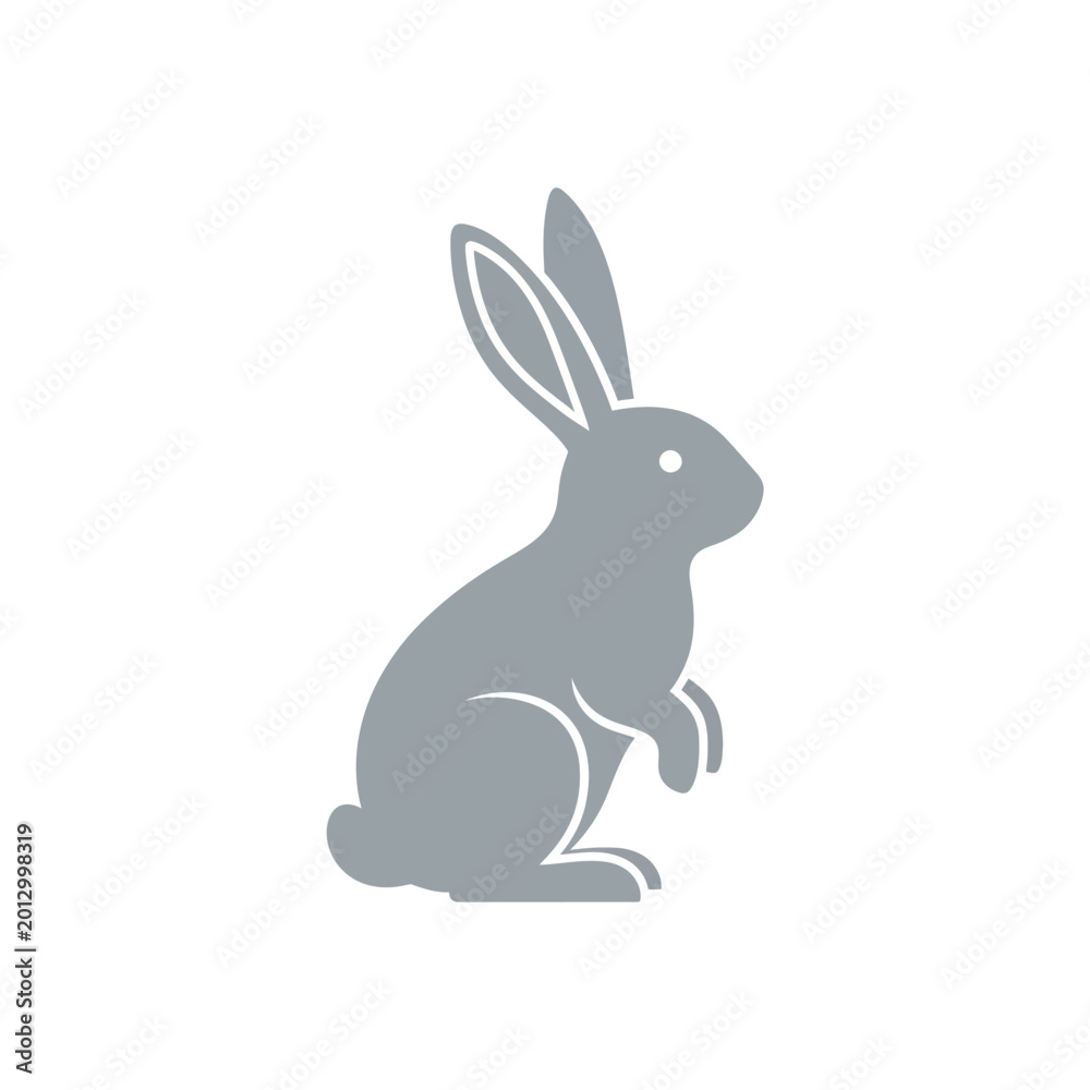 Obraz premium Gray rabbit sitting on ground.