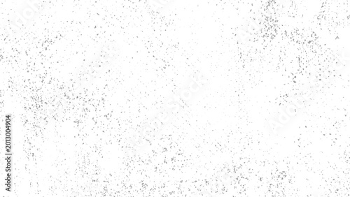Valokuva Gray particles scattered on white surface with no distinct shape or form present