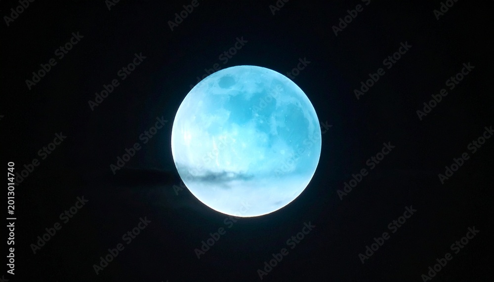 Obraz premium Blue moon glowing in night sky
