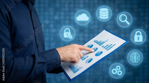Hand pointing at financial charts on clipboard surrounded by glowing digital icons representing data security and analysis statistics finance business technology graph report