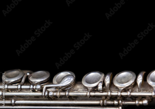 Foto A fragment of a flute on a black background