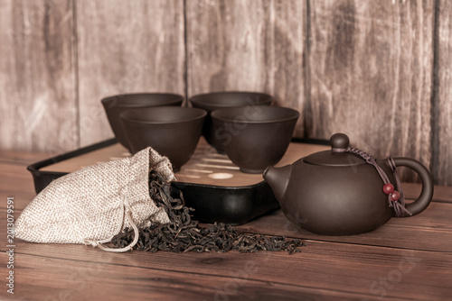Clay tea set in dark tones