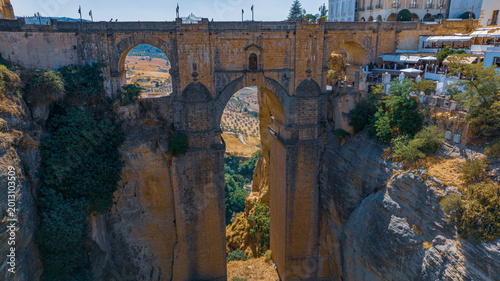 Foto Aerial photograph of a bridge and streets, facades of old houses in a town in Sp