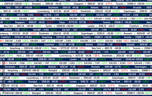 Stock market ticker board, global indices and currency exchange rates market data. Trading, research, banking, financial markets, investment strategy, business, buying und selling stocks.