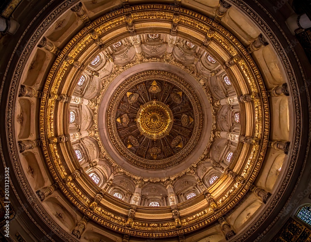Fototapeta premium Ornate, detailed grand interior dome with golden hues