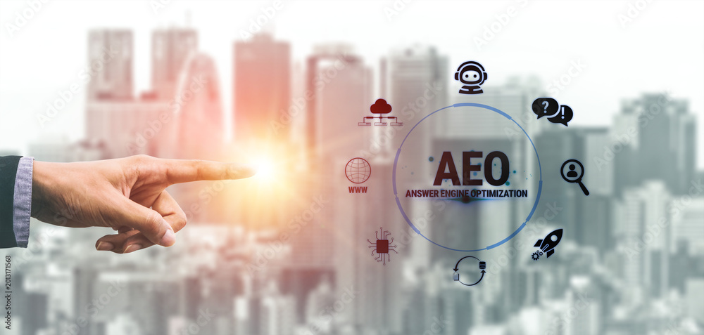 Fototapeta premium Hand Reaching Towards AEO Concept with Urban City Background and Digital Elements Representing Answer Engine Optimization Strategies Fluxor.