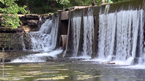 Built in 1962, this concrete dam is a mere 10 feet high but 190 feet long, playing a significant role in the water management of the region. 
