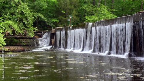 Built in 1962, this concrete dam is a mere 10 feet high but 190 feet long, playing a significant role in the water management of the region. 