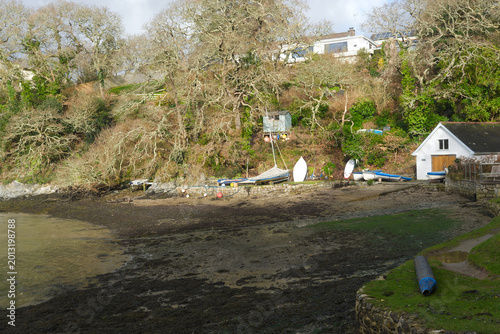 Bild auf Leinwand Idyllic rural scenery at English ria of Helford River on a winter day