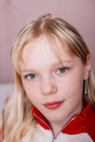 Close up portrait of blonde teenage girl with natural makeup