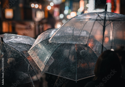 Photography transparent umbrella on a rainy night