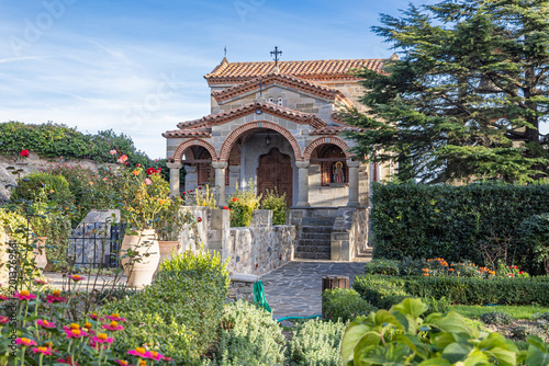 Chapel and garden at the Monastery of Saint Stephen on the rock formations of Meteora.