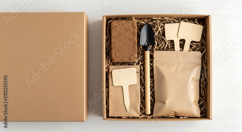 Gardening kit box with soil, shovel, plant markers mockup, blank spaces for text
